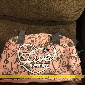 Justice zippered travel bag.